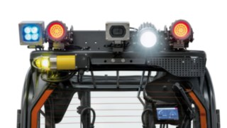 Różne systemy oświetlenia bezpieczeństwa oraz Linde Reverse Assist Camera w wózku elektrycznym E14 firmy Linde MH z ochroną przeciwwybuchową